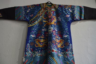Lot 203 - Purple ground silk-embroidered ‘dragon’ robe,...