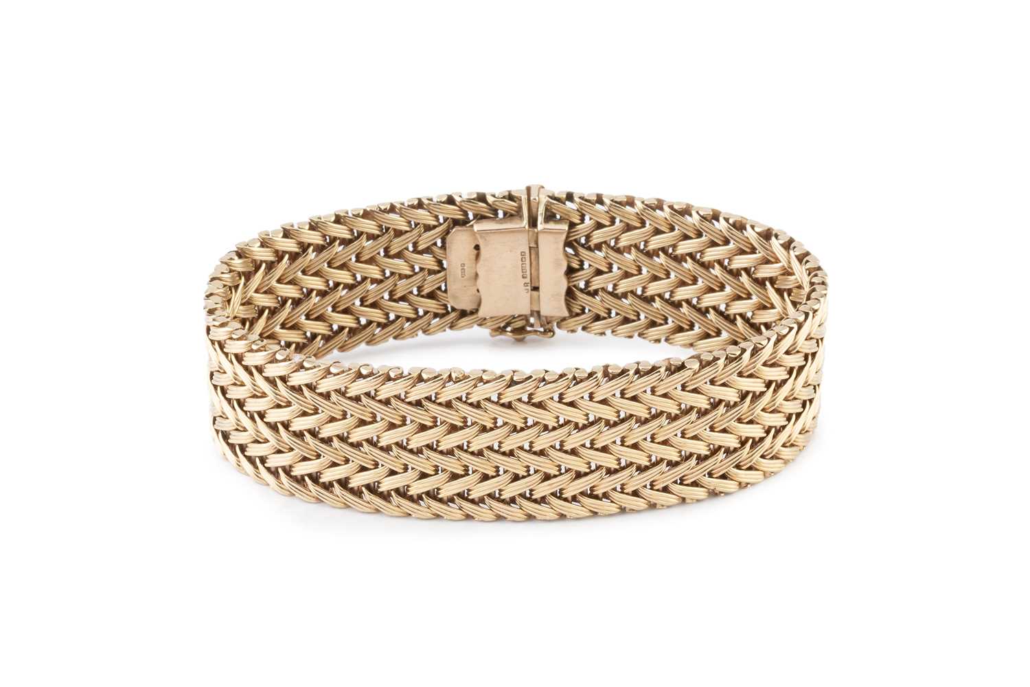 Lot 8 - A 9ct gold fancy-link bracelet, of plaited...