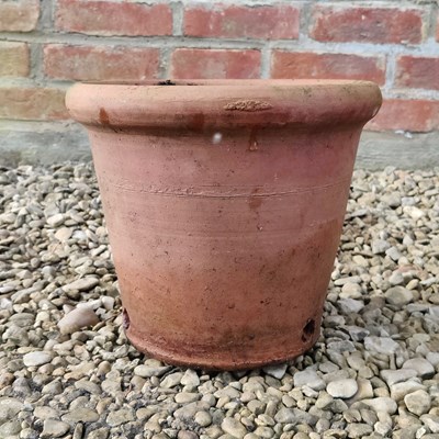 Lot 1502 - A collection of fourteen similar thrown terracotta pots