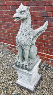 Lot 1501 - A cast reconstituted stone garden sculpture