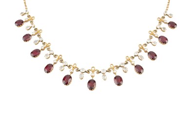 Lot 30 - A vari gem-set fringe necklace, designed as a...
