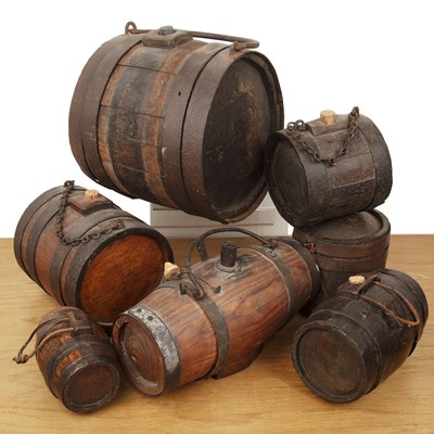 Lot 311 - Collection of seven oak costrels with iron...