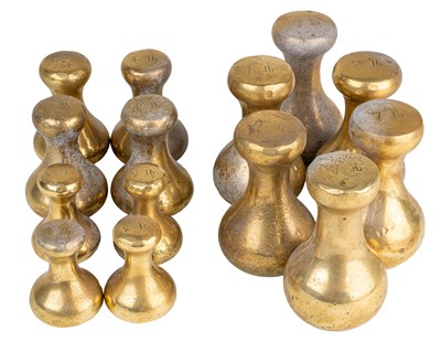 Lot 26 - A group of fourteen brass bell weights