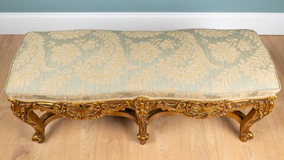 Lot A carved gold-painted wooden stool