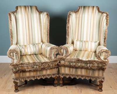 Lot 145 - A pair of Carolean-style wingback armchairs