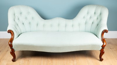 Lot 243 - An Aesthetic Movement mahogany-framed two-seater settee