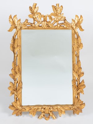 Lot 54 - A George III-style gilt wall mirror