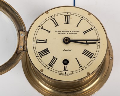 Lot 1189 - A mid-20th century brass ship's bulkhead clock