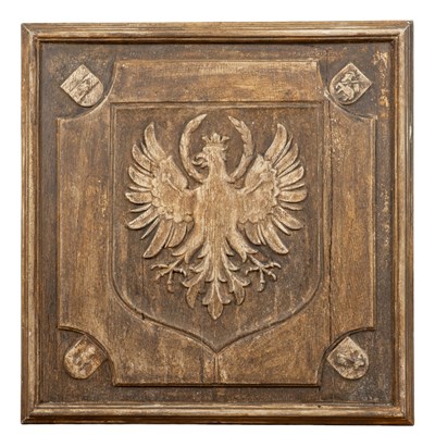 Lot 507 - A carved wood armorial panel