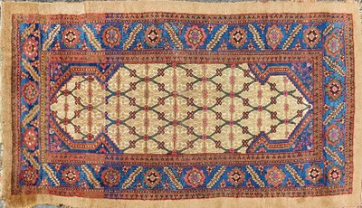 Lot 1402 - An early 20th century hand-woven woollen Turkish rug