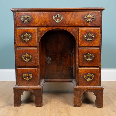 Lot 2 - A mid-18th century mahogany kneehole desk