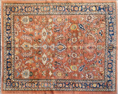 Lot 1410 - A 20th century Heriz carpet