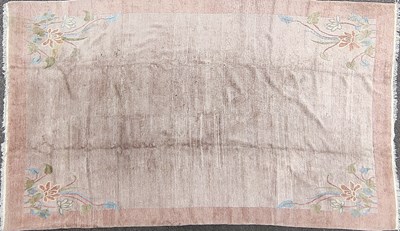 Lot 1385 - A modern hand-woven Nepalese-style carpet