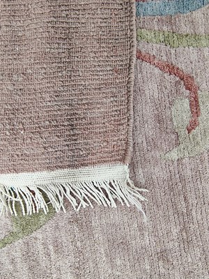 Lot 1249 - A modern hand-woven Nepalese-style carpet