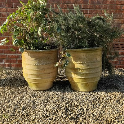 Lot 1469 - A pair of shaped terracotta pots