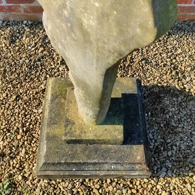 Lot 1560 - A cast composite abstract stone sculpture of a tree