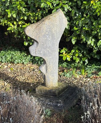 Lot 1560 - A cast composite abstract stone sculpture of a tree