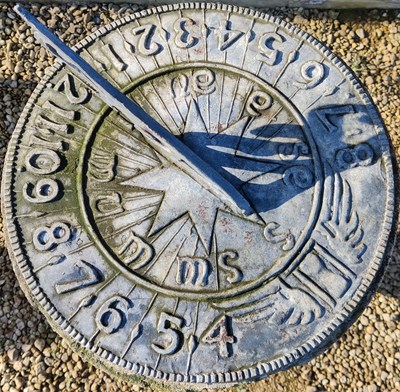 Lot 1457 - A lead sundial on a reconstituted stone base