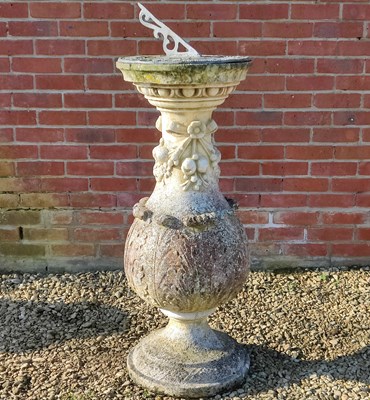 Lot 1457 - A lead sundial on a reconstituted stone base