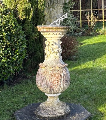 Lot 1457 - A lead sundial on a reconstituted stone base