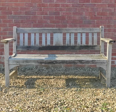 Lot 1551 - A teak garden bench