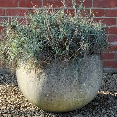 Lot 1465 - A cast composite stone planter