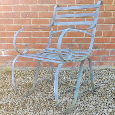 Lot 1522 - A galvanised steel garden armchair
