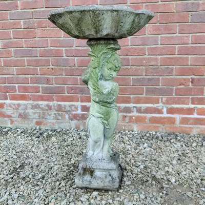 Lot 1487 - A cast reconstituted stone birdbath