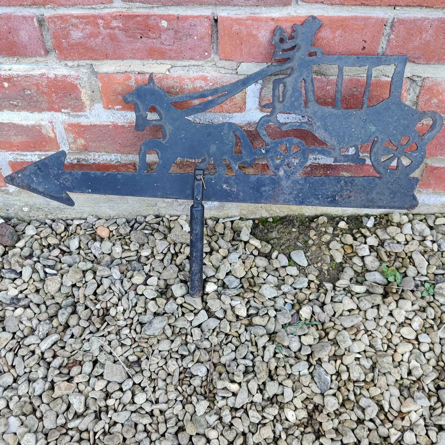 Lot 1549 - A black-painted wrought iron weathervane