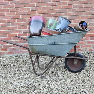 Lot 1556 - A galvanised wheelbarrow
