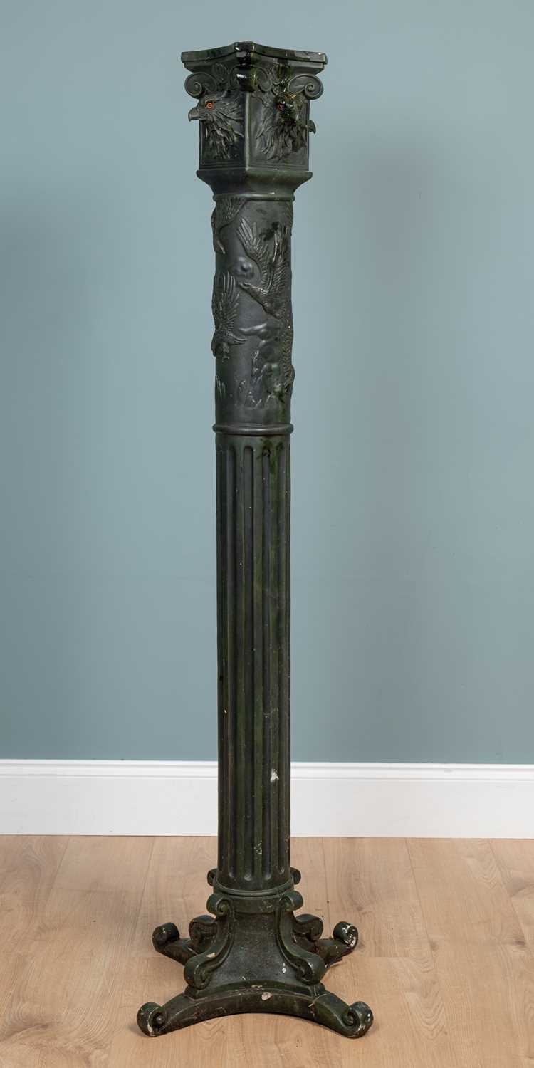 Lot 454 - A green cast resin lamp standard