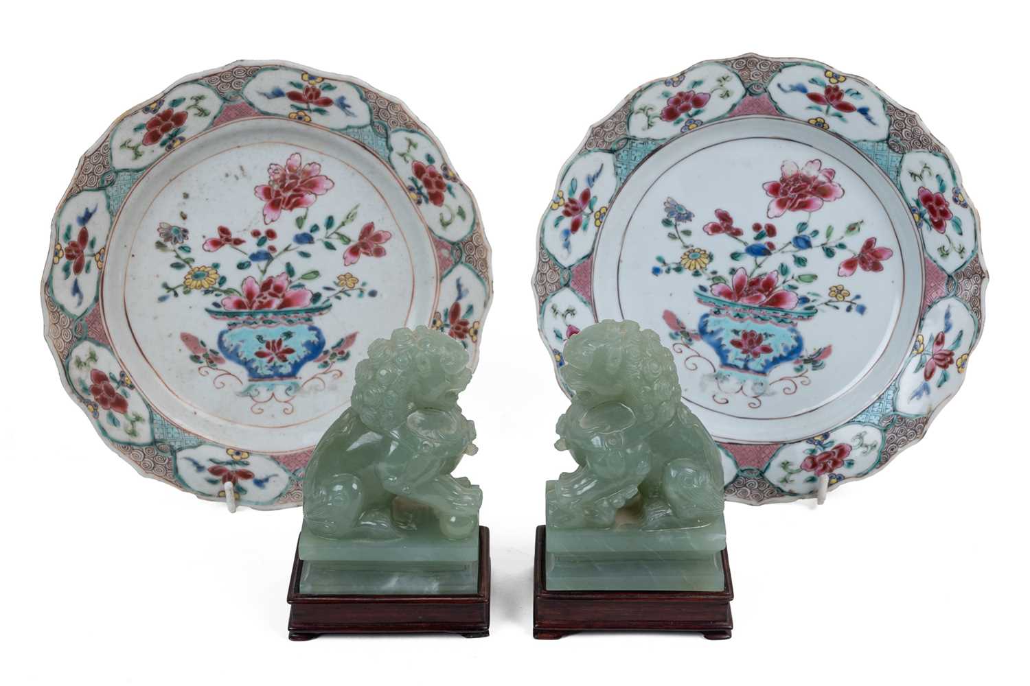 Lot 483 - A pair of Chinese dogs of fo and a pair of famille rose porcelain plates
