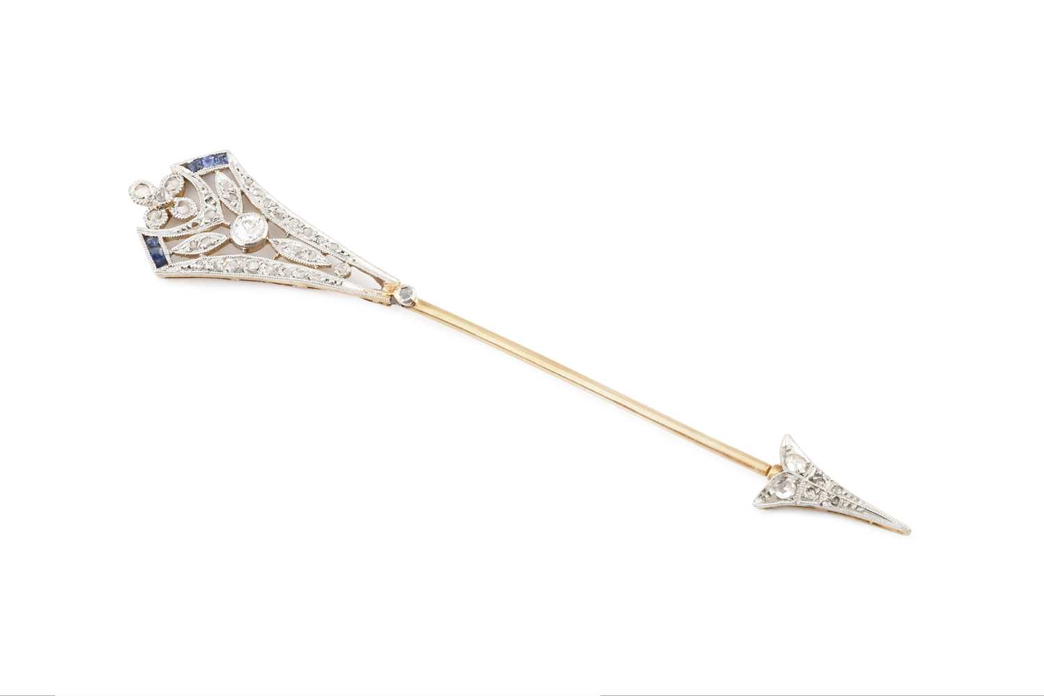 Lot 120 - A diamond and gem set jabot pin, designed as...