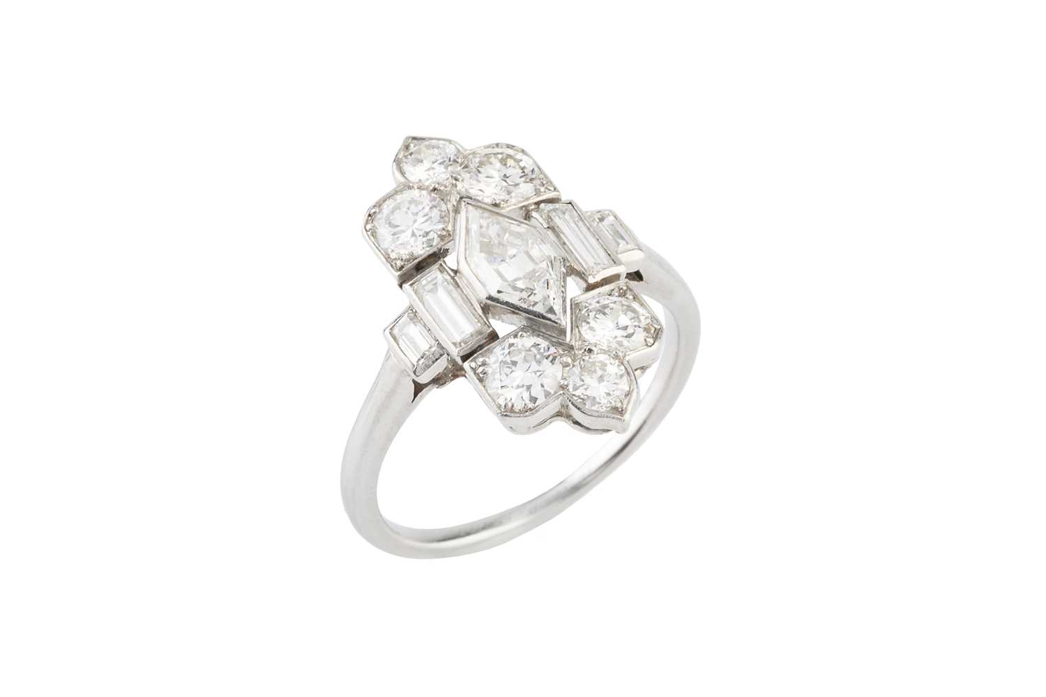 Lot 150 - An Art Deco diamond panel ring possibly by...