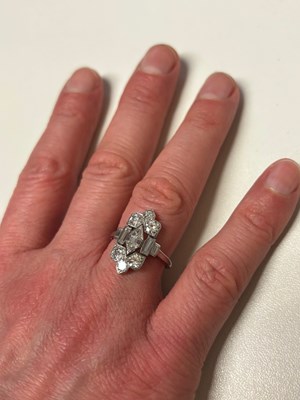 Lot 150 - An Art Deco diamond panel ring possibly by...