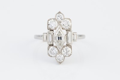 Lot 150 - An Art Deco diamond panel ring possibly by...
