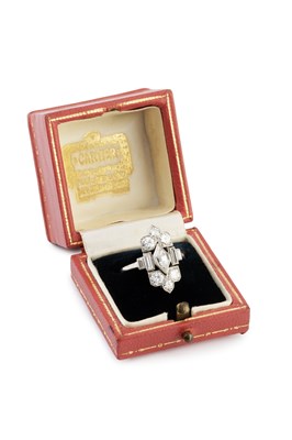 Lot 150 - An Art Deco diamond panel ring possibly by...