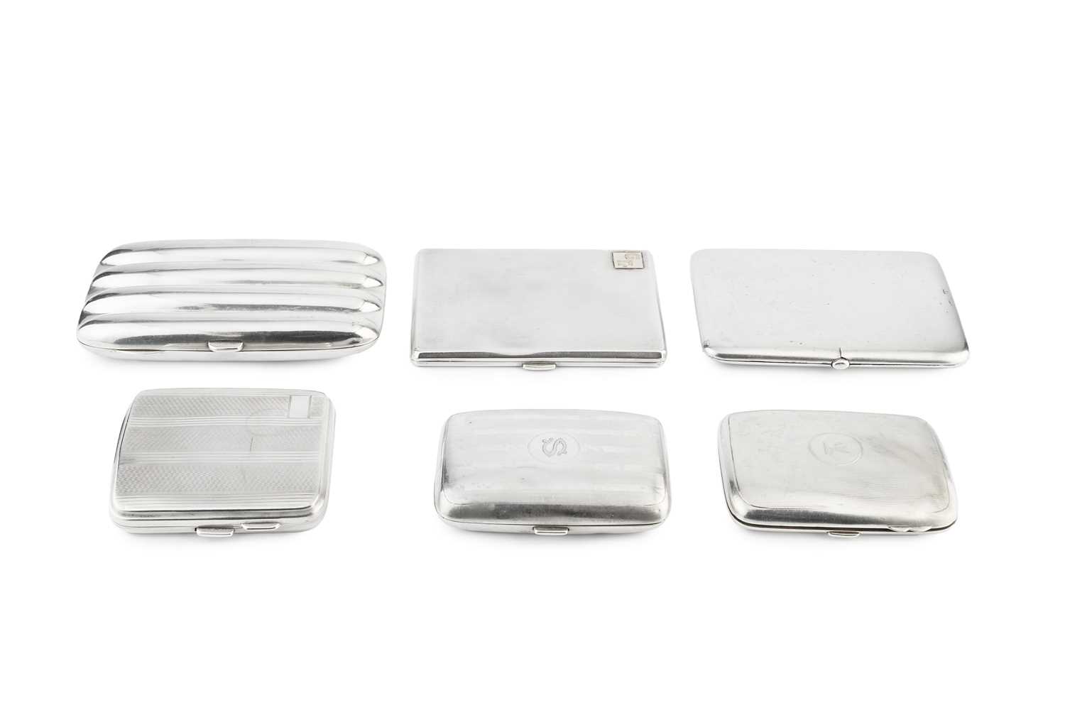 Lot 548 - An Edwardian silver cigar case, of lobed form,...