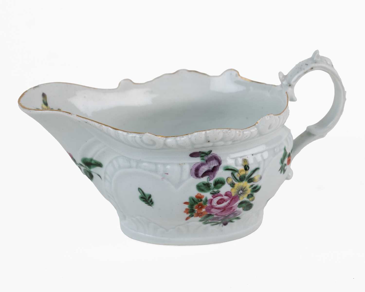 Lot 1373 - An 18th century Liverpool, Phillip Christian, porcelain butter boat