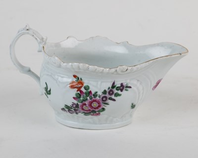 Lot 1373 - An 18th century Liverpool, Phillip Christian, porcelain butter boat