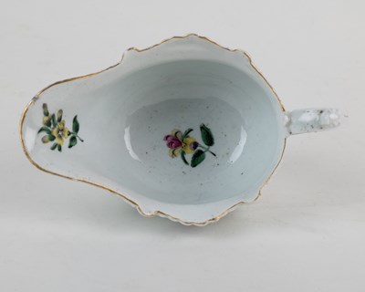 Lot 1373 - An 18th century Liverpool, Phillip Christian, porcelain butter boat