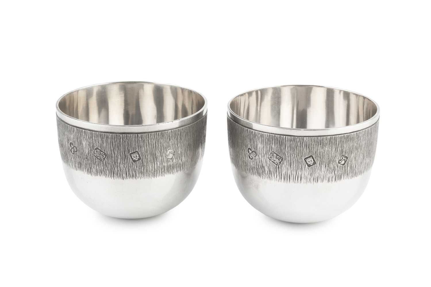 Lot 554 - A pair of silver tumbler cups, of plain...
