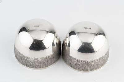 Lot 554 - A pair of silver tumbler cups, of plain...