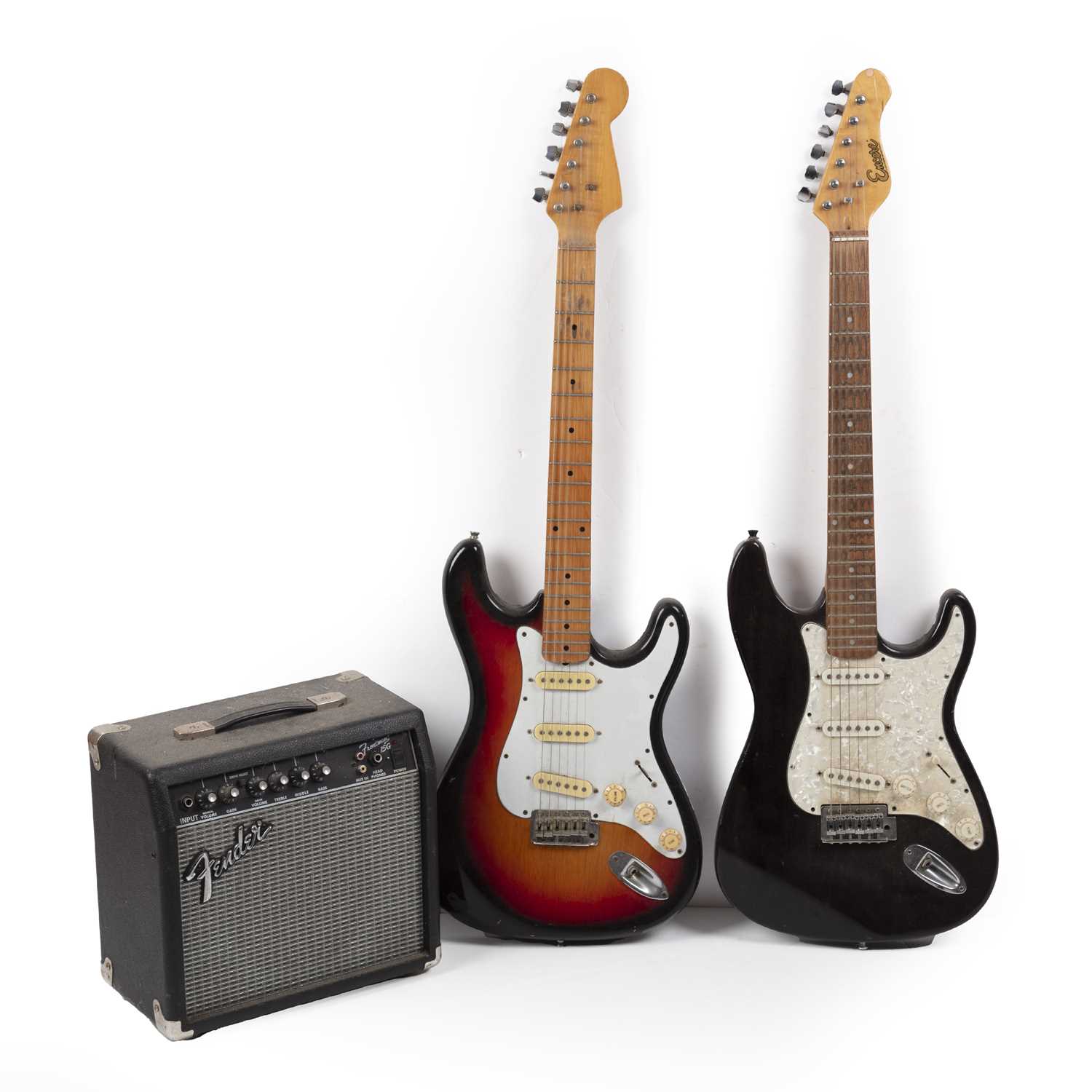 Lot 243 - An 'Encore' electric guitar, together with...