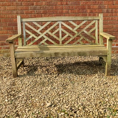 Lot 1559 - A teak garden bench