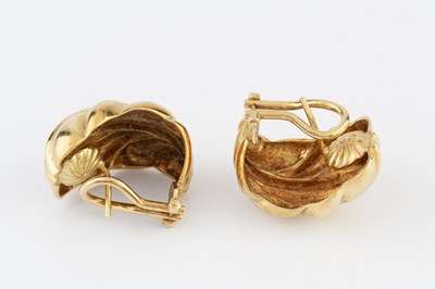 Lot 56 - A pair of 18ct gold earrings, of leaf design,...