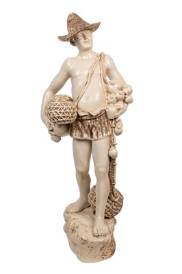 Lot 434 - A 19th century Bretby Staffordshire fisherboy statue