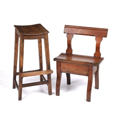 Lot 157 - An antique elm stool with square tapering legs...