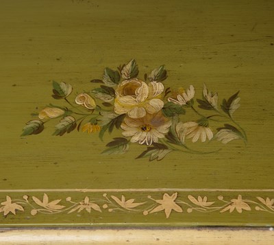 Lot 2 - An Edwardian waterfall bookcase with green...