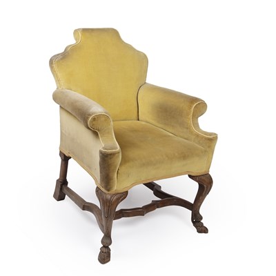 Lot 4 - A Georgian style yellow upholstered armchair...